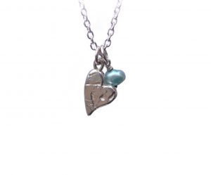 Handcrafted silver heart pendant with an Italian blue fresh water pearl