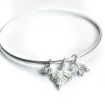 Silver bangle with two leaves
