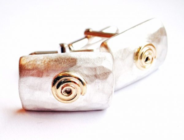 cufflinks with gold spiral