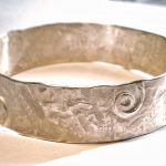 Hand beaten silver bangle