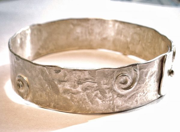 Hand beaten silver bangle