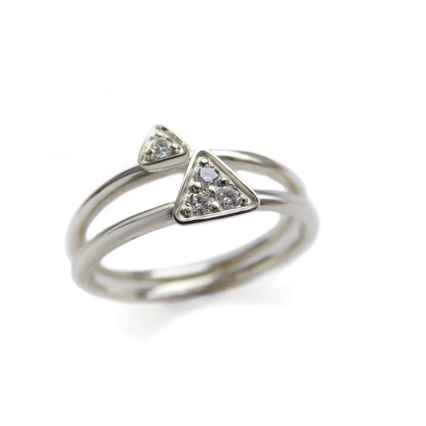 white gold triangular rings set with diamonds