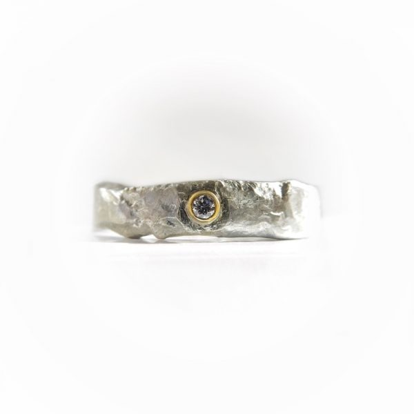 Beautifully textured diamond and silver ring